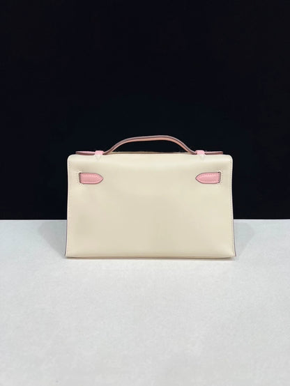 Hermes Kelly Pochette Craie & rose Sakura Pink Swift Leather with light gold hardware