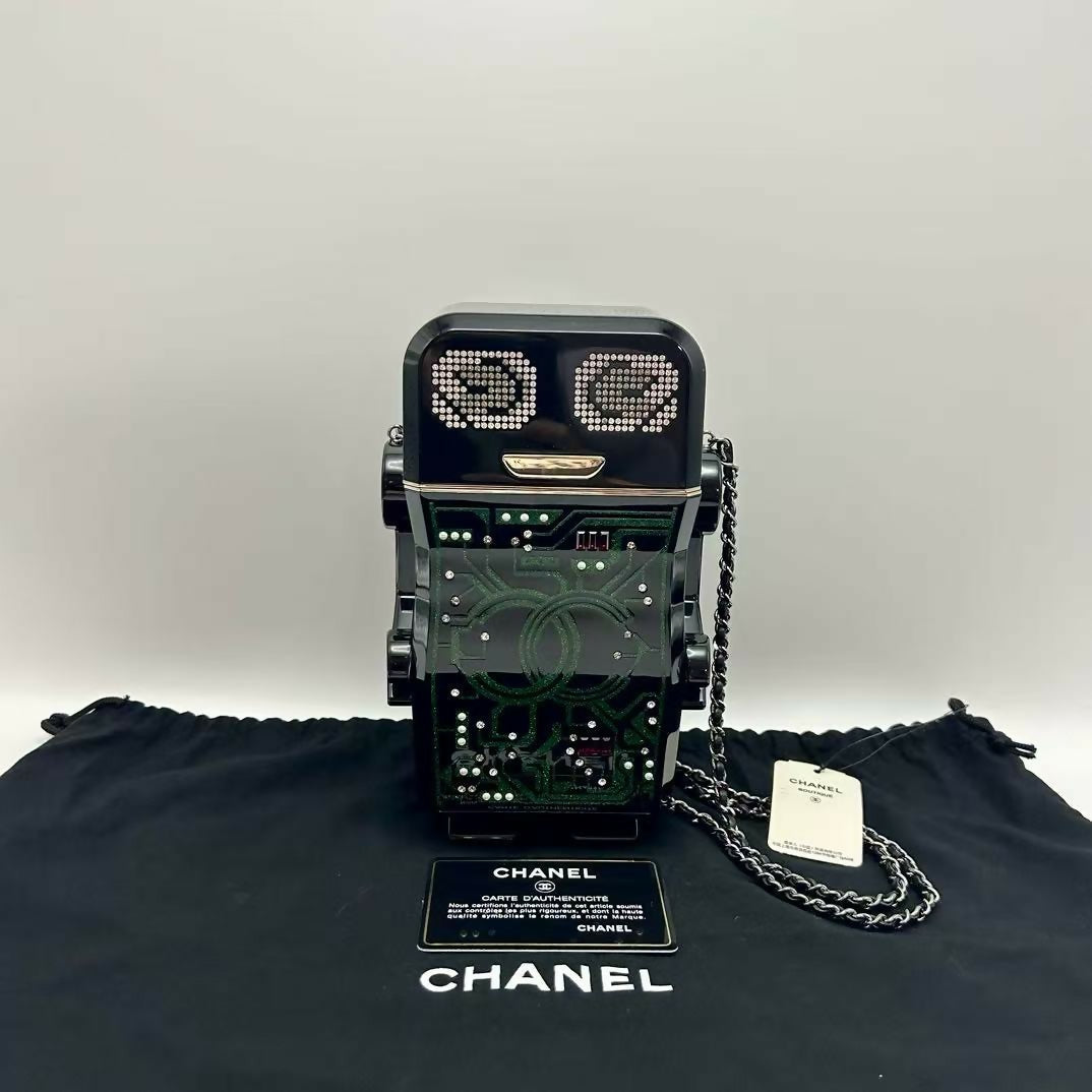 pre-owned chanel limited edition robot minaudière bag black plexiglass and crystals ruthenium hardware
