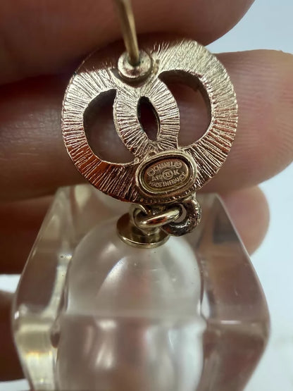 Chanel 19K gold pearl and acrylic earrings
