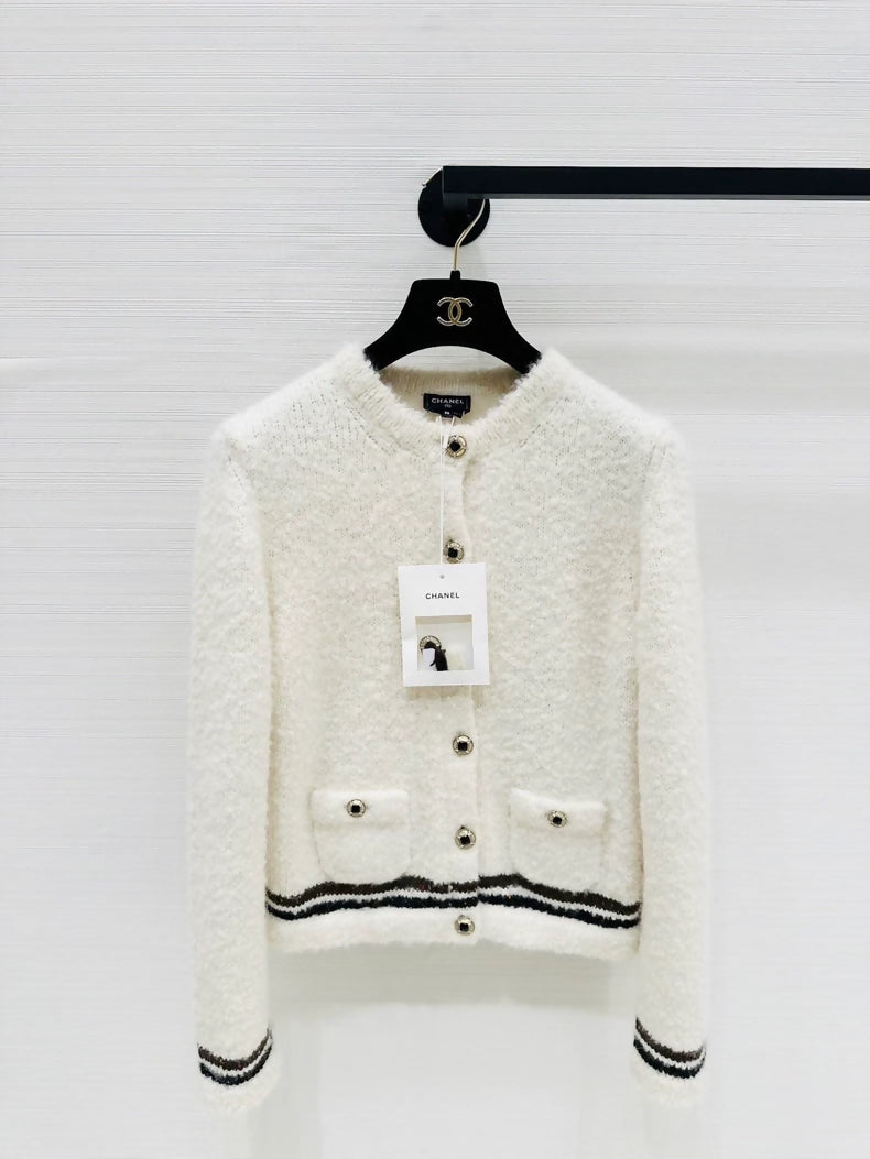 Chanel 25N ski vest with white and brown trim