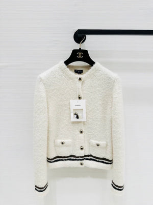 Chanel 25N ski vest with white and brown trim