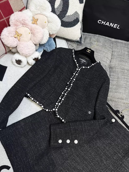 Chanel 25P black pearl-trimmed tweed jacket