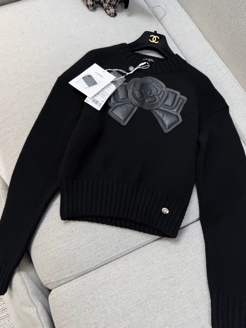 Chanel 20k black leather camellia bow knit top