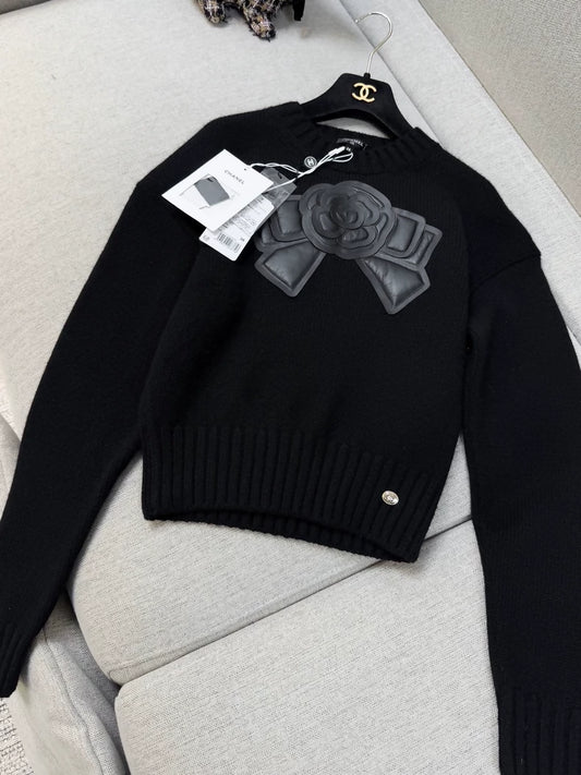 Chanel 20k black leather camellia bow knit top