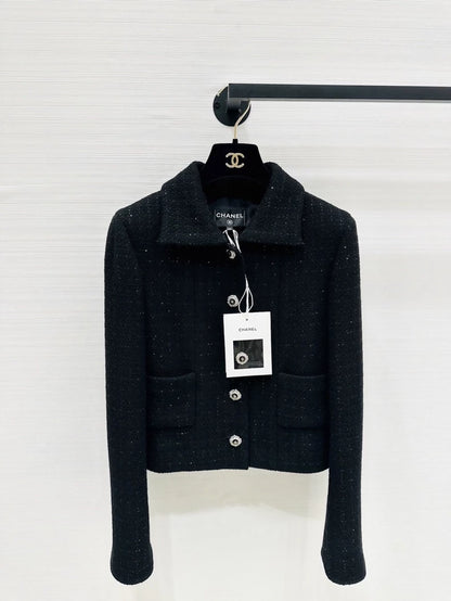 Chanel 25k black tweed jacket