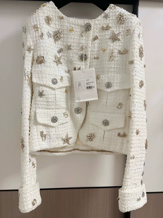 Chanel 22C ecru tweed with gold charms jacket,