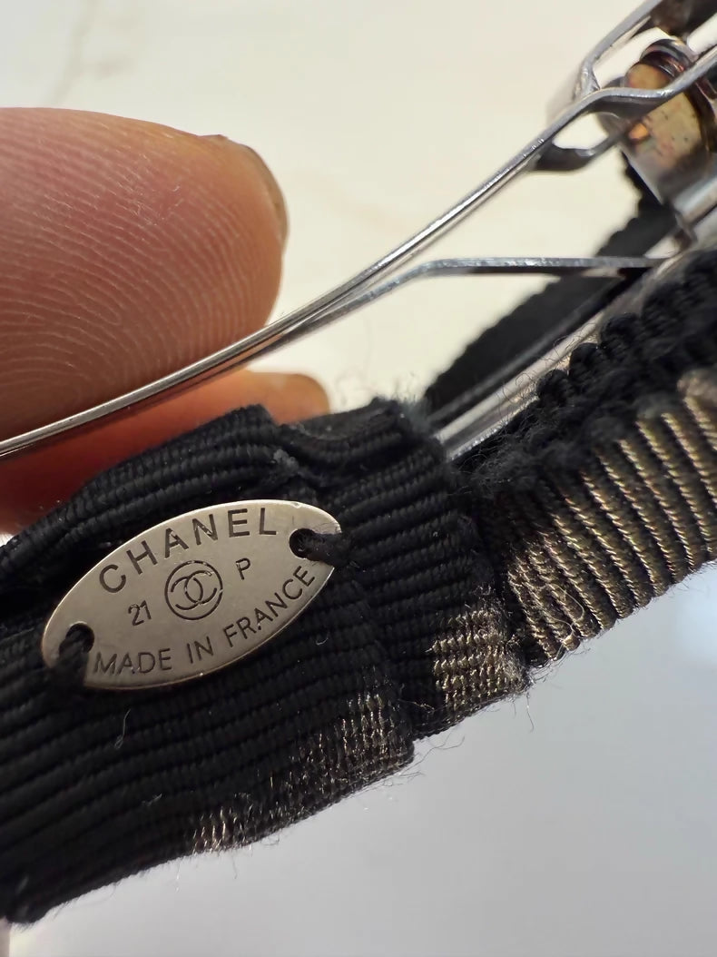 Chanel's classic black bow double-C hair clip