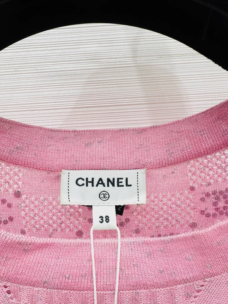 Chanel 23p pink top adorned with CC logo and rhinestones