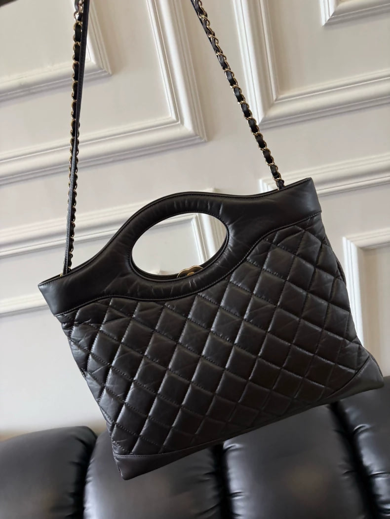 Chanel 23A black and gold calfskin 31 bag