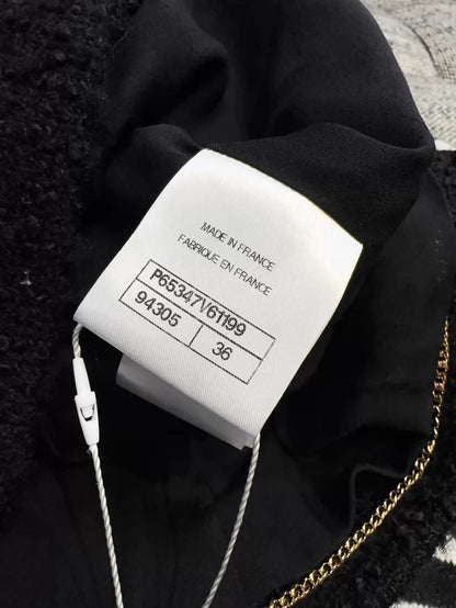 Chanel 20k black tweed jacket