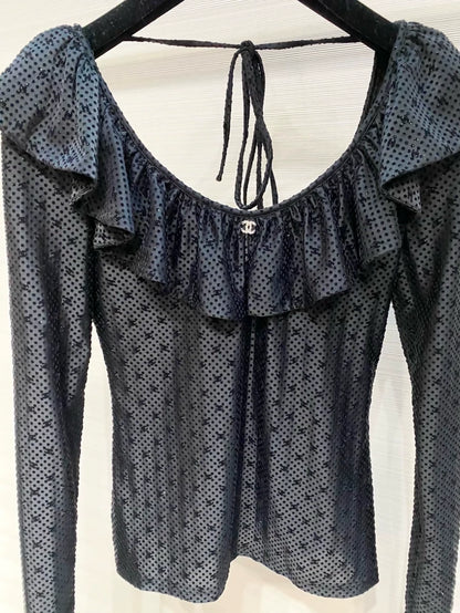 Chanel 24B black top with ruffles