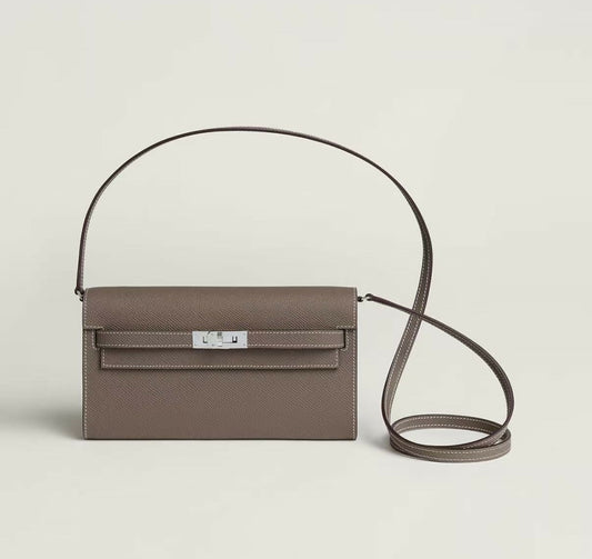 Hermès Kelly To Go wallet bag in taupe grained leather with palladium turn-lock and thin shoulder strap