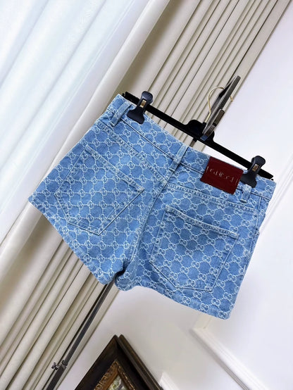 Gucci light blue logo all-over denim shorts