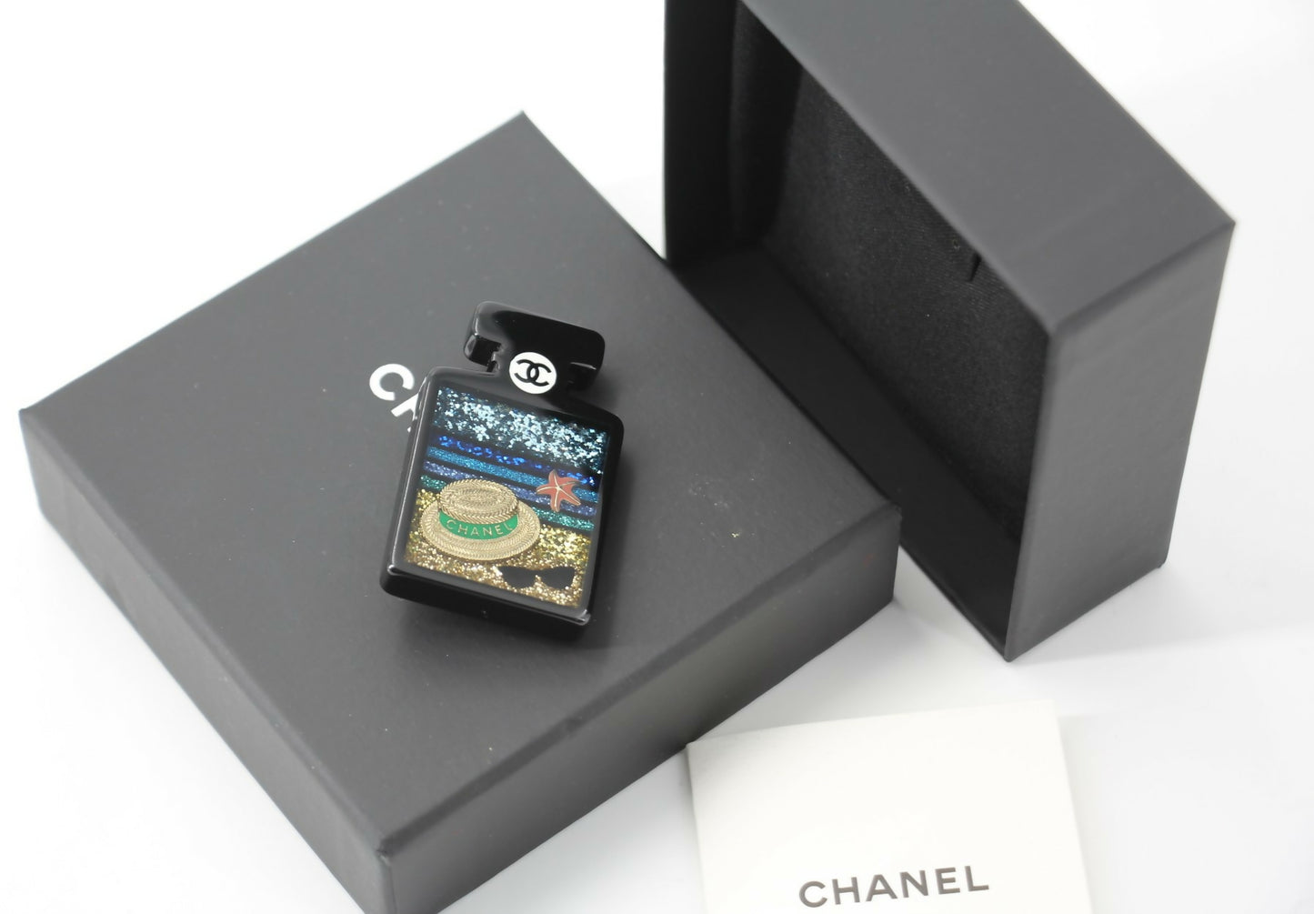 Chanel 18S Resin Beach Black Perfume Bottle Brooch