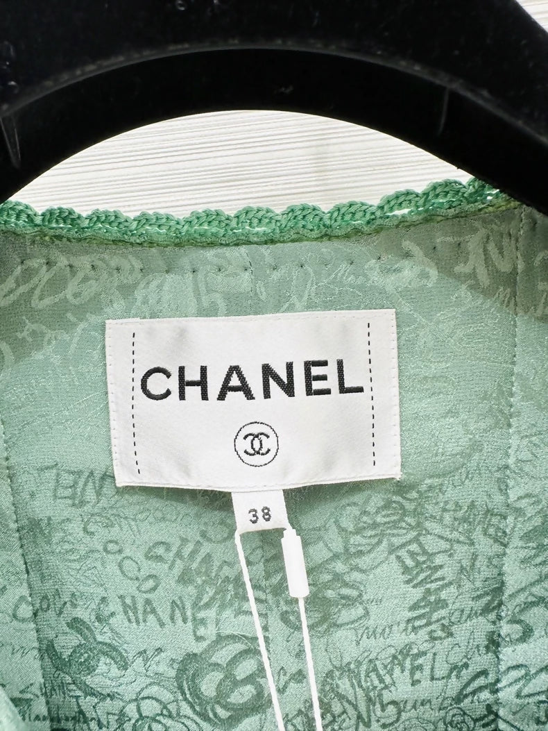 Chanel 24A green tweed jacket and skirt set