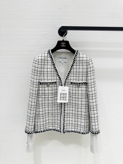 Chanel 24C jacket in black and white checkered tweed