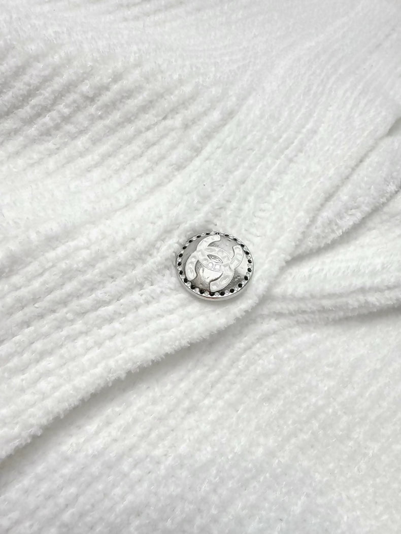 Chanel 23C white ribbed terry knit cardigan with black #5 beaded badge embroidered label