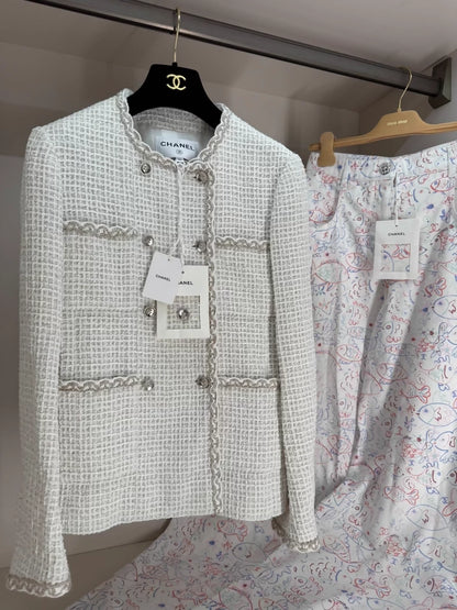 Chanel 25s white tweed jack yet