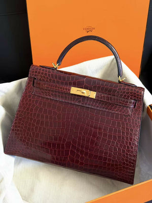 Hermès Kelly 32 Rouge H / Bordeaux Red Shiny Porosus Crocodile with Gold Hardware