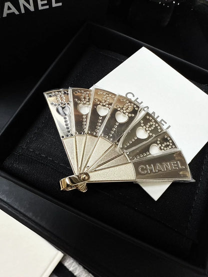 Chanel 25A metal brooch