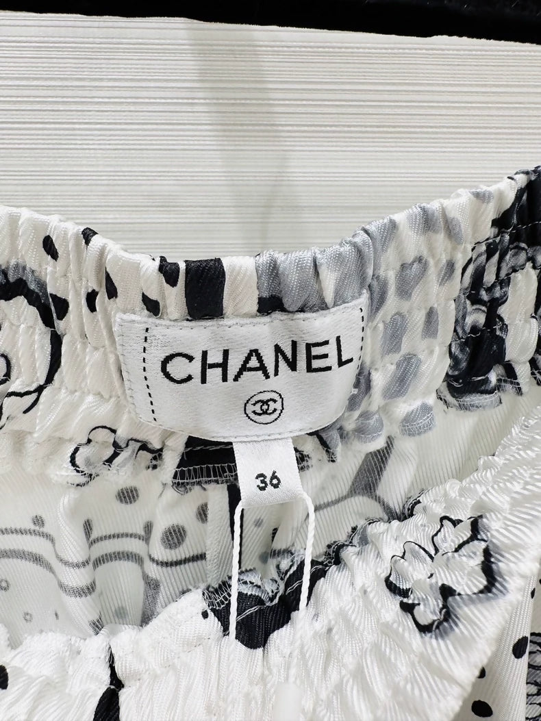 Chanel 25b wide-leg trousers in printed silk