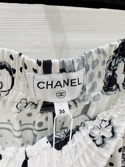 Chanel 25b wide-leg trousers in printed silk