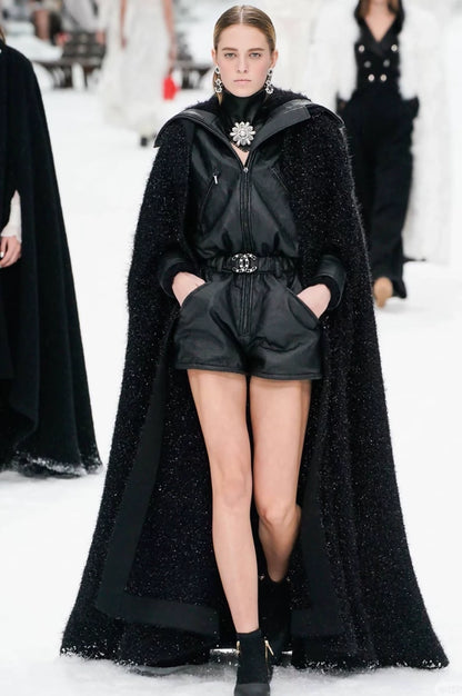 Chanel, black iridescent extra-long cape from the Chanel 2018 Snow Collection