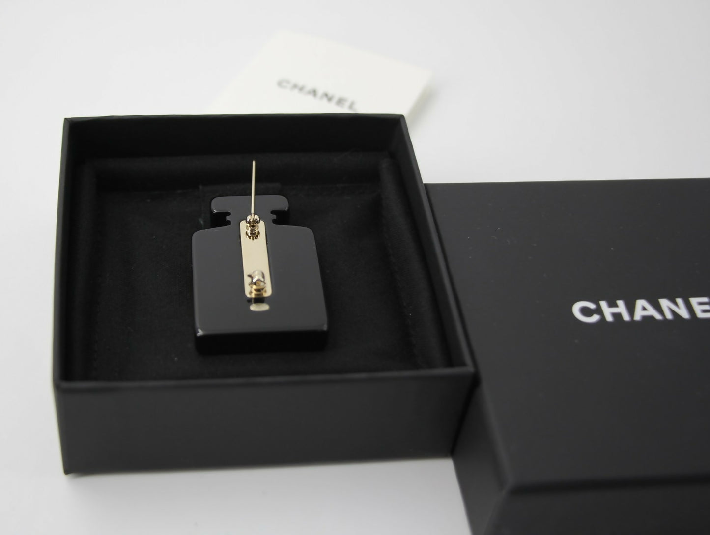 Chanel 18S Resin Beach Black Perfume Bottle Brooch