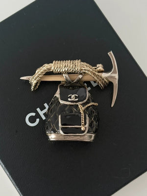 Chanel 2015 backpack and hoe brooch