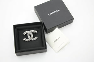 Chanel C21S Rhinestone Metallic Silver Star Twisted Brooch