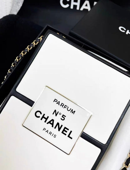 CHANEL 21SS A LIMITED EDITION WHITE & BLACK LEATHER CHANEL NO. 5 PARFUM BOX CLUTCH