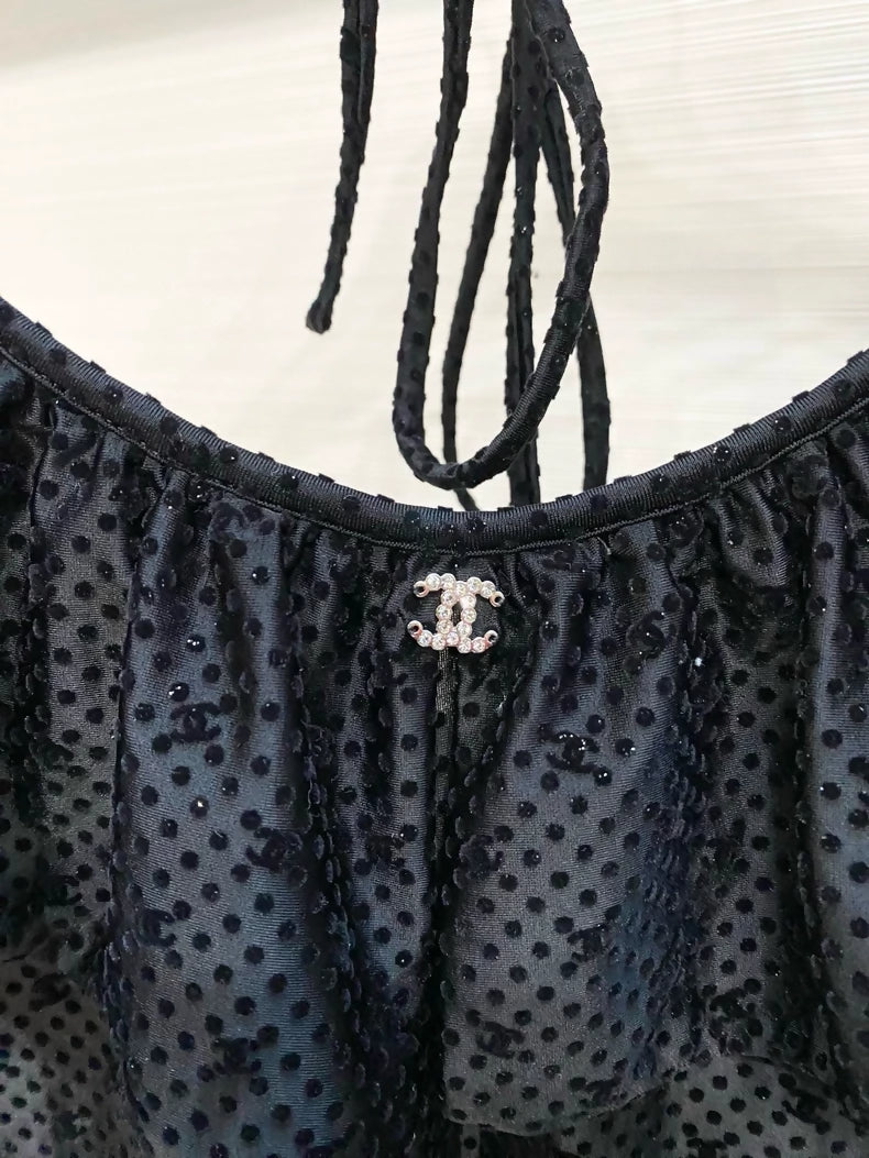 Chanel 24B black top with ruffles