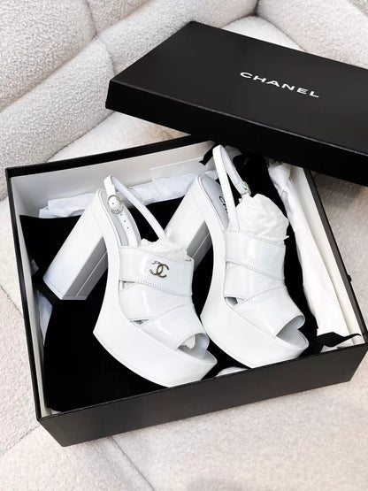 Chanel 23A white patent leather platform pumps