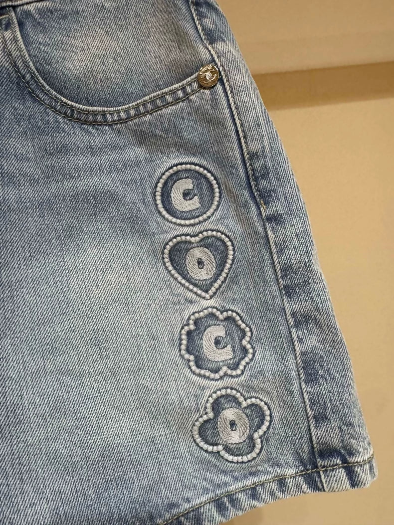 Chanel 25M blue distressed heart embroidered denim shorts
