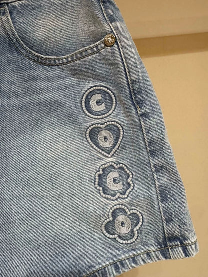 Chanel 25M blue distressed heart embroidered denim shorts