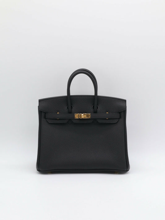 Hermès Birkin handbag in black grained leather with gold-tone turn-lock hardware and two rolled top handles