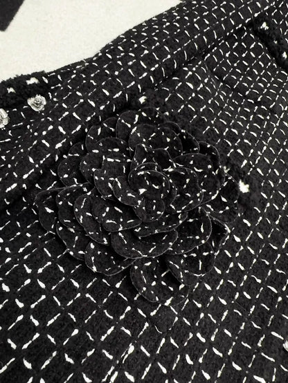 Chanel 23K black tweed jacket with white stitching