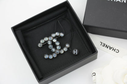 Chanel 17K Rhinestone Starlight Blue CC Brooch