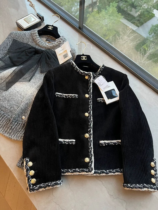 Chanel 25k black velvet jacket