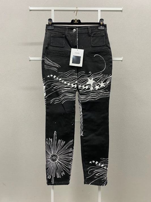 The Chanel 22C black and white graffiti denim pants