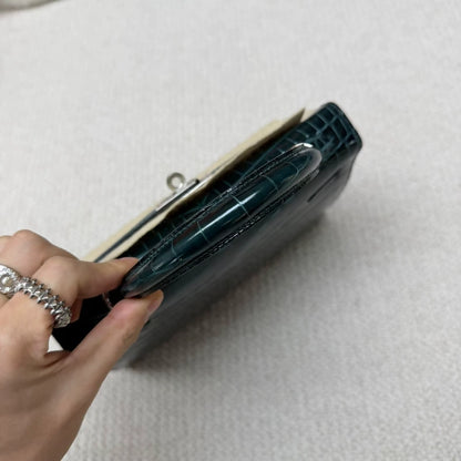 Hermes Kelly 25 Vert Rousseau Green shiny crocodile leather palladium hardware