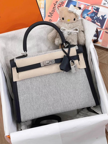 Hermès Kelly 25 black swift leather and Grey canvas palladium hardware