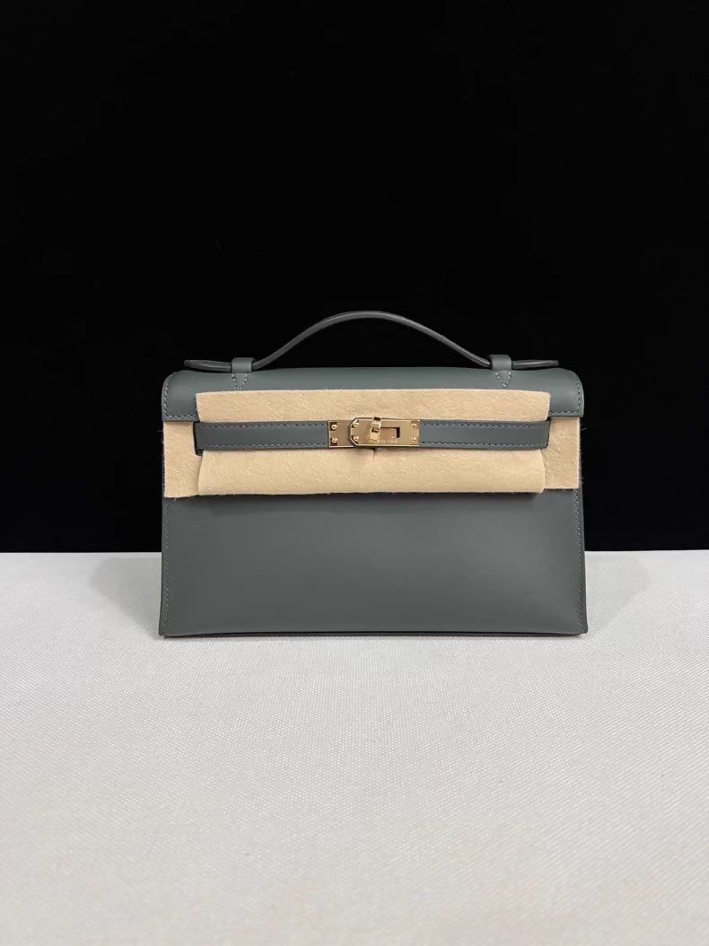 Hermes Kelly Pochette Vert mangrove swift leather with Light Gold hardware