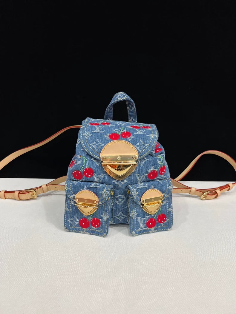 Louis Vuitton Takashi Murakami collaboration cherry denim backpack