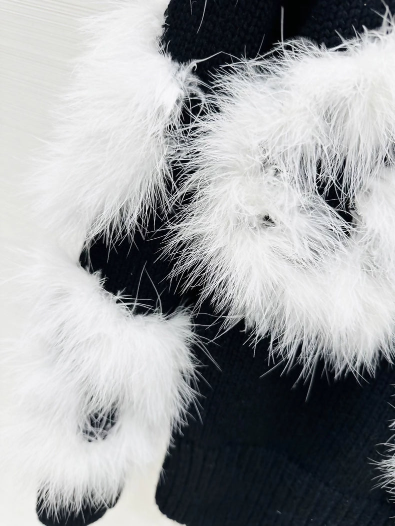 Chanel 23K black and white knit top