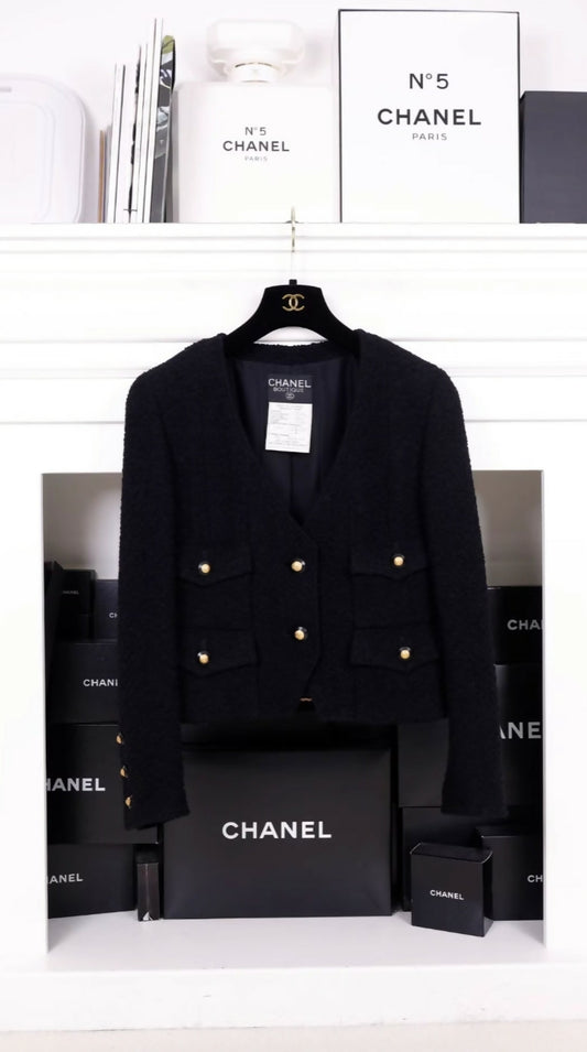 Chanel 1993 Black Wool Four-Pocket Cropped Jacket with Black and Gold Buttons.