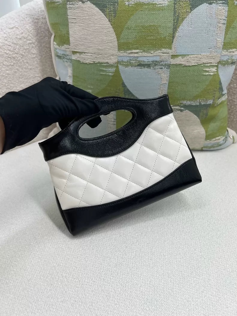 Chanel black and white panda-themed 31 mini nano bag