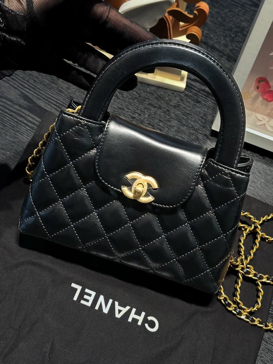 Chanel 23k small Kelly black quilted handbag gold hardware