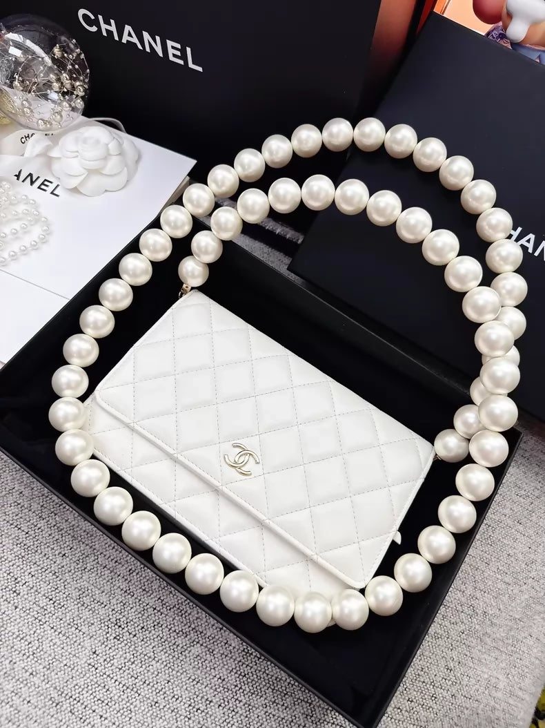 Chanel 20k ecru gold pearl chain WOC shoulder bag