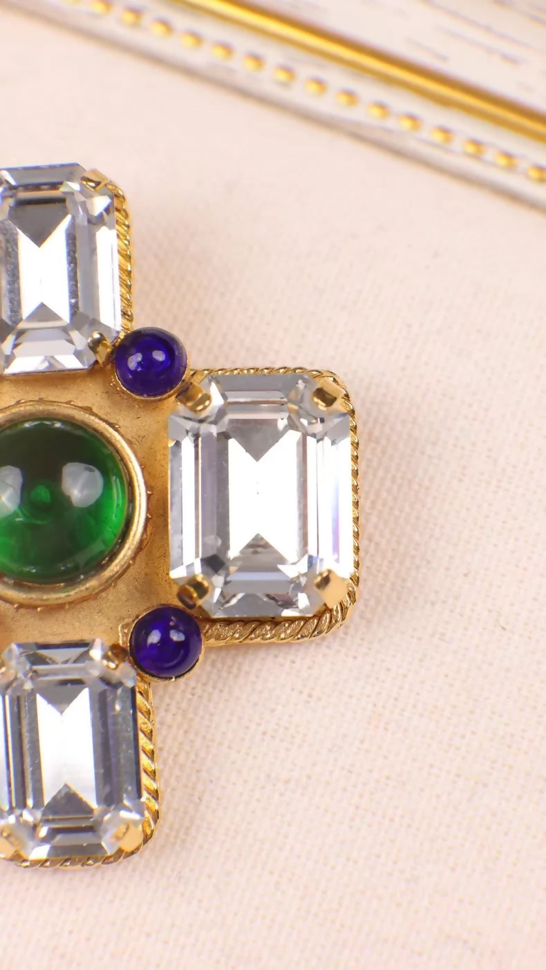 Chanel 1991 Brooch with Blue-Green Glass Rhinestone Inlay and Cross Design
